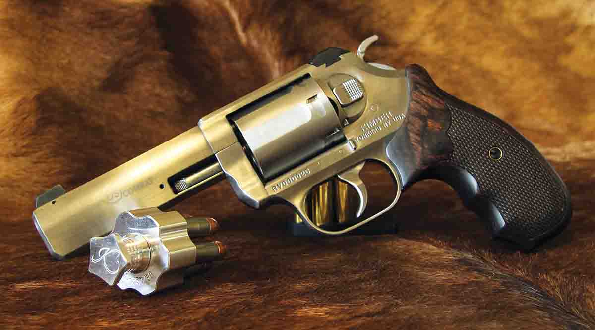 A Kimber K6s DASA Combat 357 Magnum with a Kimber Speedloader.